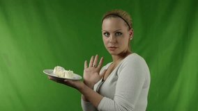Girl refuses to eat cream horns - Sweet cakes - Time for dessert - Video footage to chroma-key background.