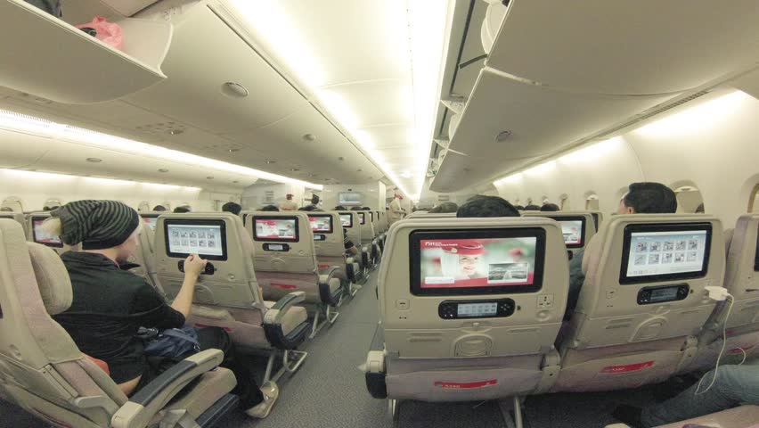 HONG KONG - DECEMBER 2: Passengers board interior of modern airplane on December