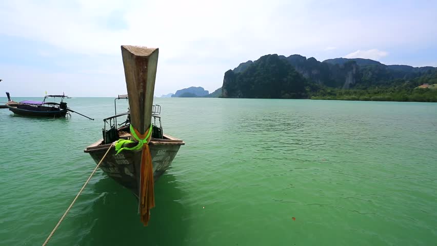 KRABI - CIRCA DECEMBER 2013: View on pier with traditional long tailed boats,