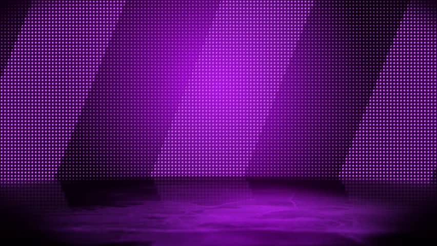 An abstract loopable studio background with flashing lights.  In 4K UltraHD.