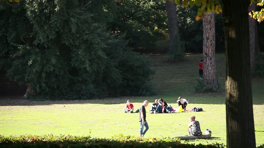ROME, ITALY - September 12, 2012: People at "Villa Ada Park" relaxing and playing Royalty-Free Stock Footage #5227469