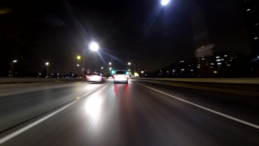 Freeway Driving Night Toronto Timelapse. Driving down the Gardiner Expressway,