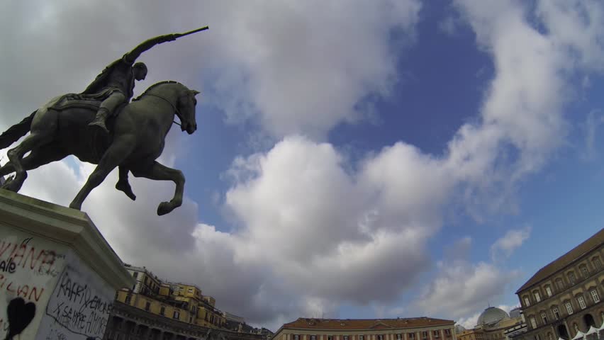 NAPLES, ITALY - CIRCA DECEMBER 2013: Plebiscito Place and Saint Peter and Paul Church and Equestrian Statue of Charles III of Bourbon