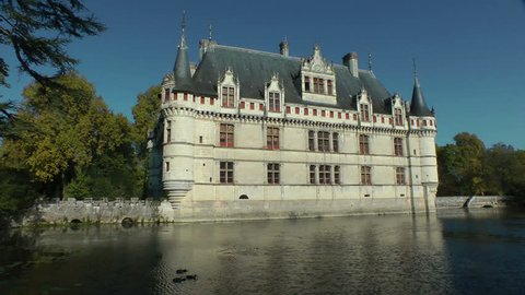 A view of the beautiful romantic Azay-le-Rideau castle, in the Loire Valley. This fable castle, built in the XVIth century, reflects on a water mirror where some duckling swim. 