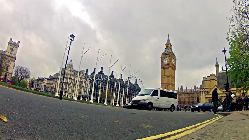 LONDON, UNITED KINGDOM - CIRCA DECEMBER, 2013: Zoom timelapse of commuters and
