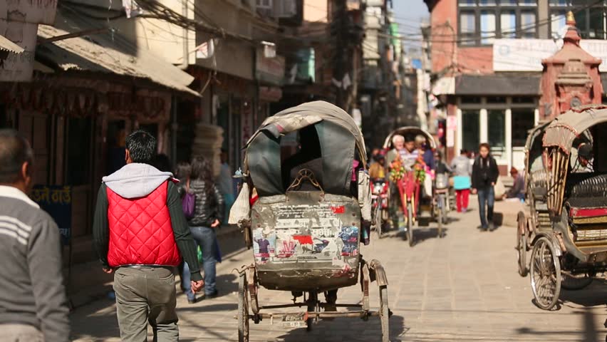 KATHMANDU, NEPAL - DEC 1: One of the busy streets in the city center, Dec 1,