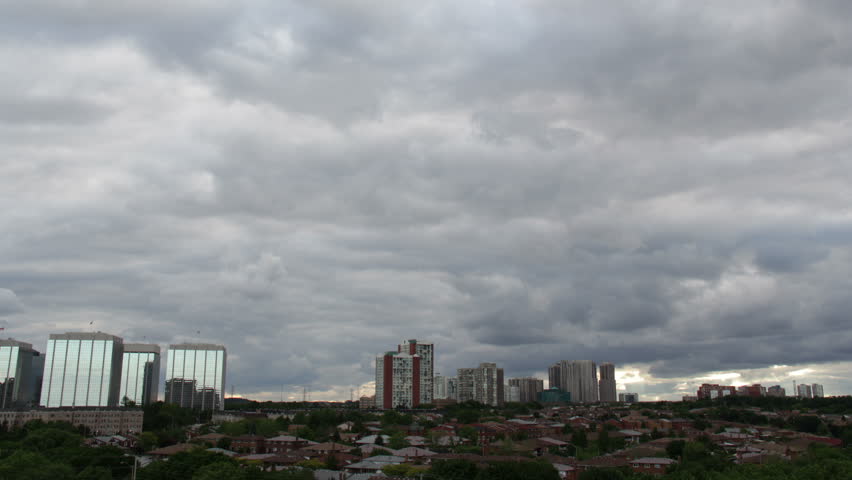 Heavens Turn to Black Over City 1. A time-lapse of nearly two hours of a cloudy