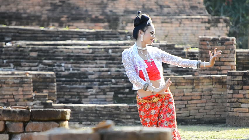 thai women in beautiful traditional dancing of thailand (long action shot)