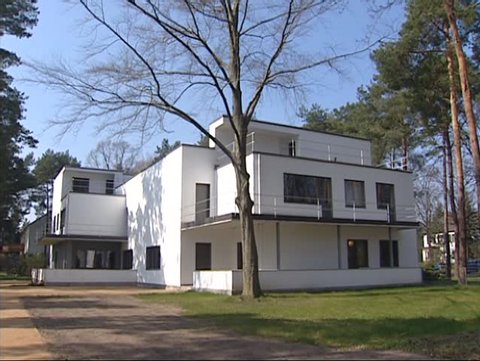 DESSAU, GERMANY - MARCH 2003: pan semidetached Kandinsky / Klee House, garden and Muche House, Masters Houses or Meisterhauser, built for the Bauhaus masters by Walter Gropius. 