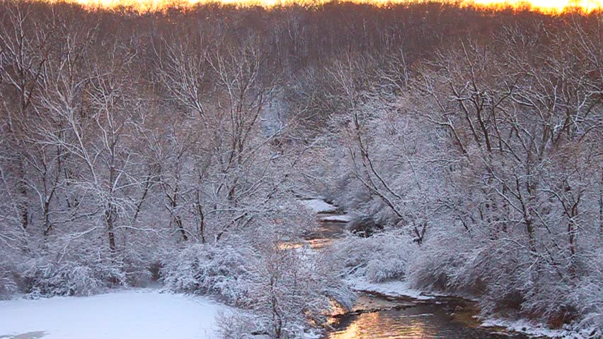 Willow Creek flows through Rock Cut State Park of Illinois on a snowy winter day