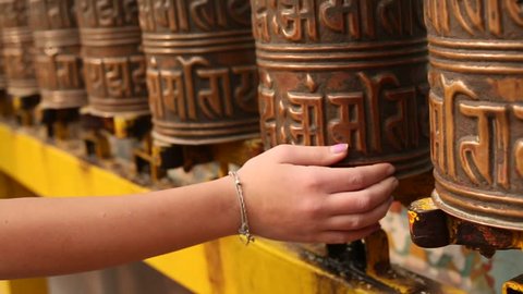 In buddhist monastery (stupa Boudhanath in Kathmandu, Nepal)