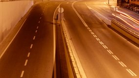 rush of night time traffic on motorway in time lapse scene, Barcelona, Spain 