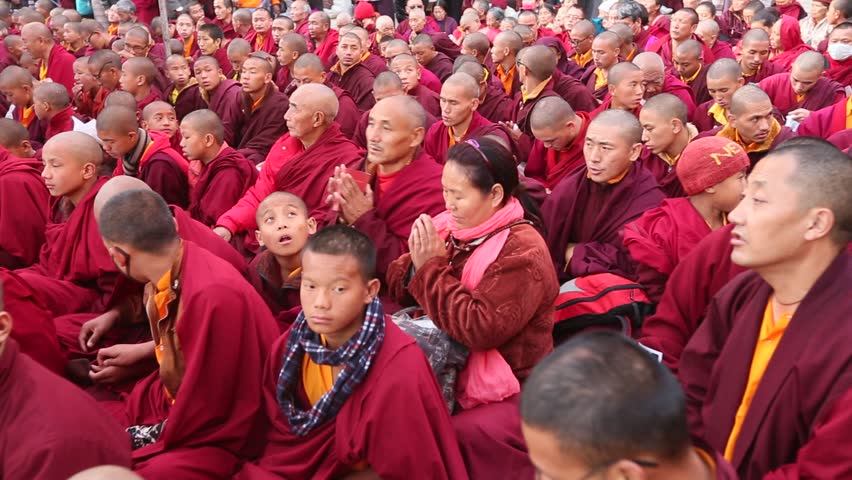 KHATMANDU, NEPAL - DEC 15: Unidentified tibetan Buddhist monks near stupa