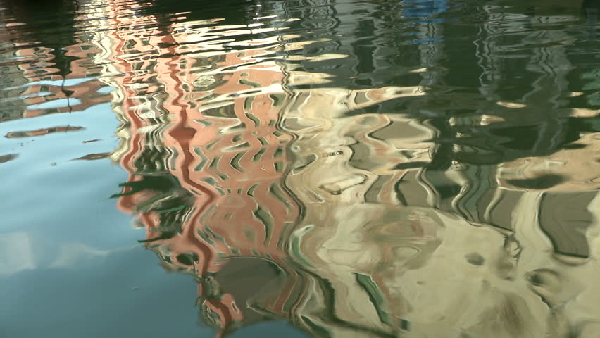 Ripple and reflection in a venetian canal, Italy