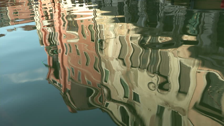 Ripple and reflection in a venetian canal, Italy