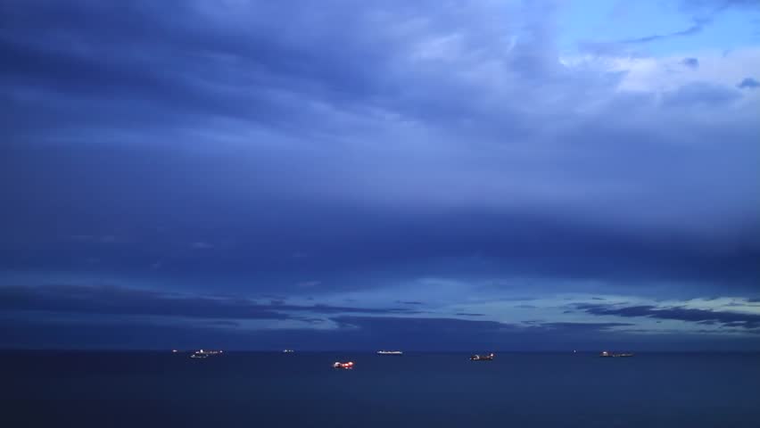 Ships out at sea in the evening