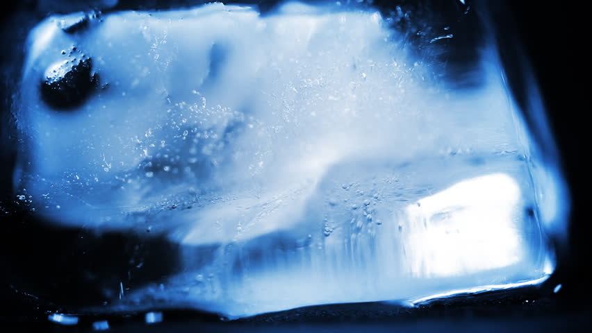 Time lapse of cold blue ice melting down