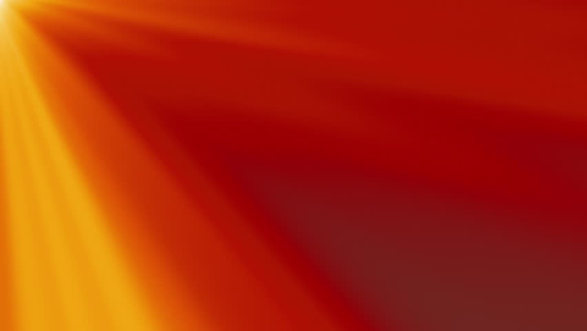 Looping clip of yellow and orange light rays on a red background, making a