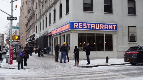NEW YORK CITY - Circa, December 15, 2013 - An establishing shot of Tom's Restaurant, a location made famous in the American sitcom, Seinfeld.