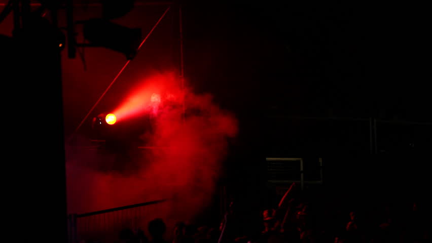 Lighting equipment and smoke at concert