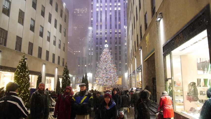 NEW YORK CITY - Circa December, 2013 - Tourists visit the tree outside
