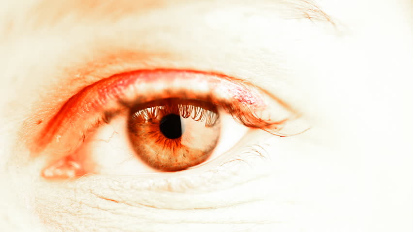 Glowing red female eye
