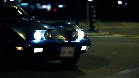 Corvette C3 driving through the city