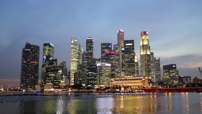 Singapore skyline and Marina Bay at dusk time lapse