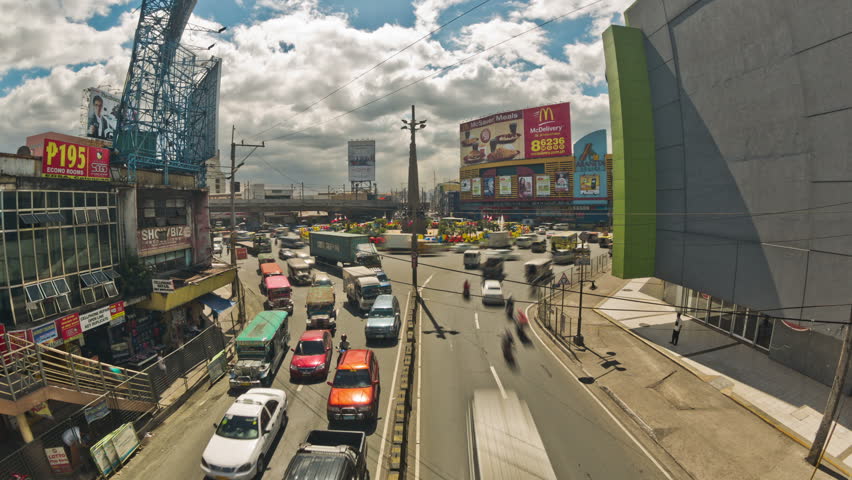 City traffic time lapse of busy Araneta Square in Manila on January 28th 2013.