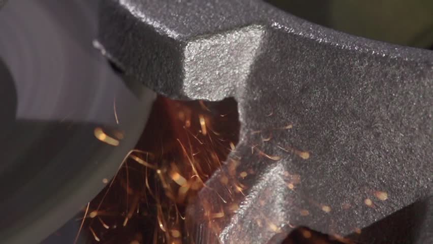 rasping metal in factory line - slow motion