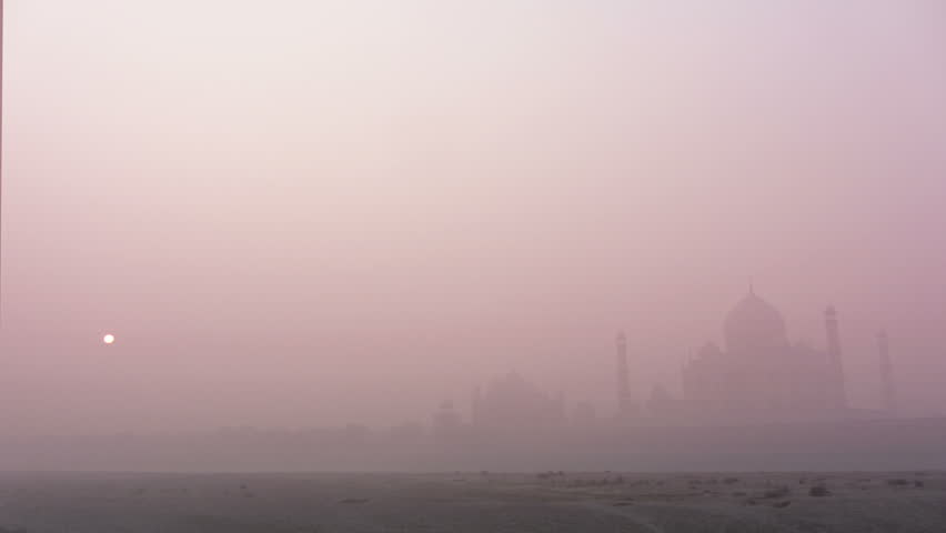 Taj Mahal at sunrise in fog - timelapse 4k