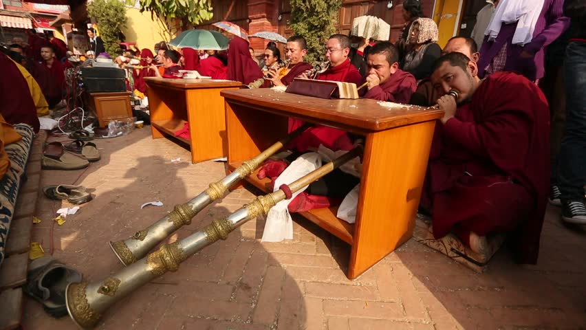 KHATMANDU, NEPAL - DEC 17: Unidentified tibetan Buddhist monks near stupa