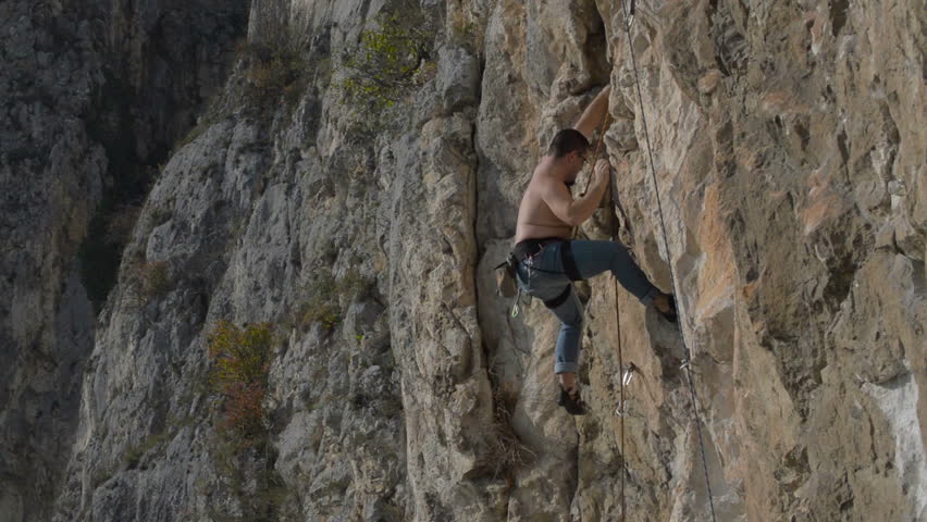 Rock climber in Turzi Gorge, Transylvania, Romania | Shutterstock HD Video #5268797