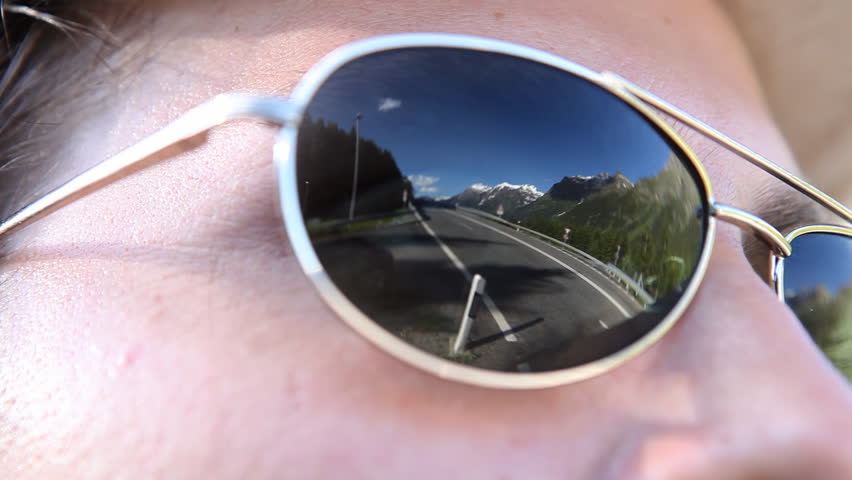 Swiss Alps mirrored in a pair of sunglasses