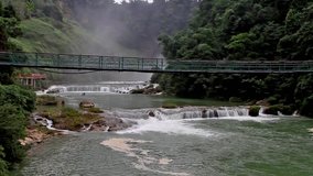 The famous Huangguoshu Waterfall and the suspension bridge, Guizhou, China