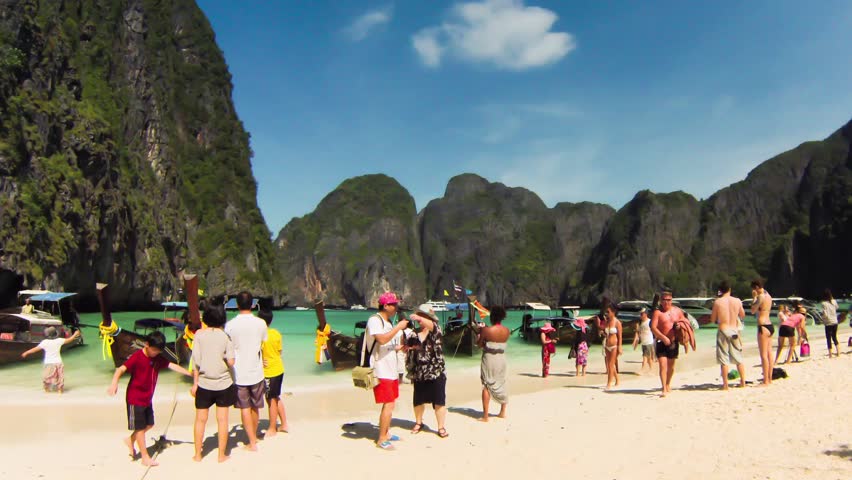 MAYA BAY, THAILAND - CIRCA DECEMBER 2013: Timelapse. Tourists at Maya bay Phi