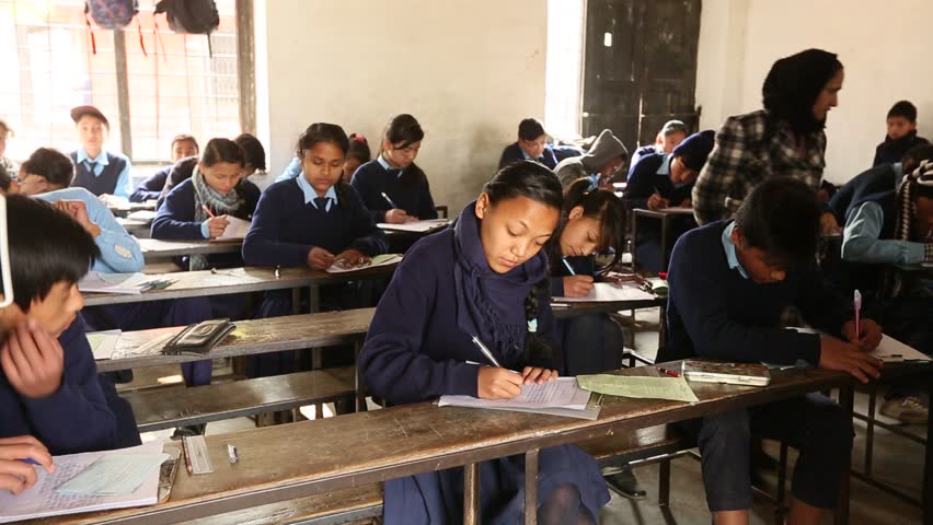 KATHMANDU, NEPAL - DEC 19: Unknown children in the lesson at public school, Dec