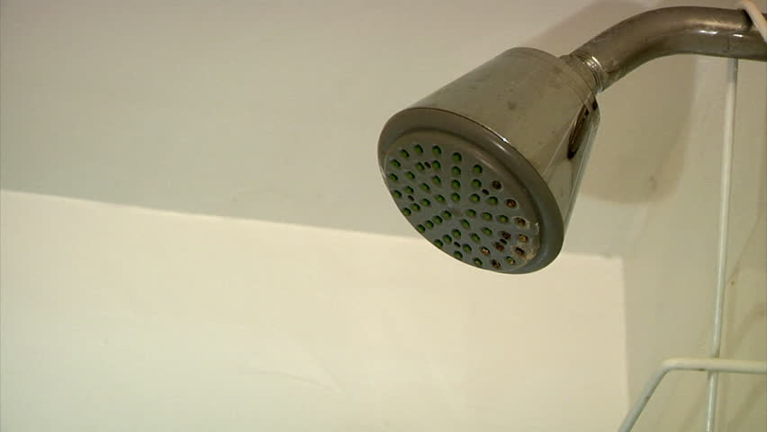 A shower head turns on and off.