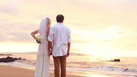 happy romantic bride and groom, sunset wedding on tropical beach, hd video