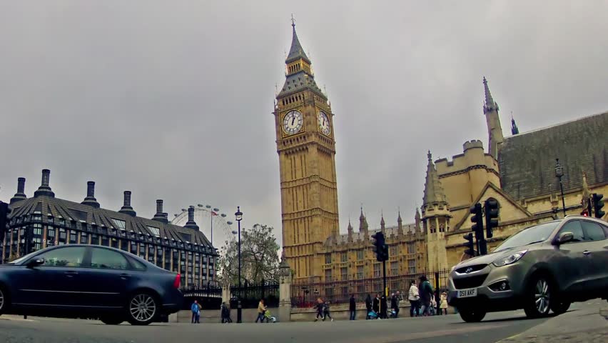 LONDON, UK - CIRCA DECEMBER, 2013: Panning zoom timelapse of commuters and