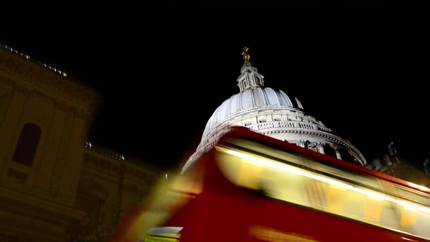 Night view of St. Paul's Cathedral, Double decker bus passing by, London,