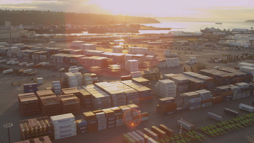 Seattle - July 2013: Aerial sun flare view of Container Shipping Port of Seattle, Pacific Northwest, Washington State, USA