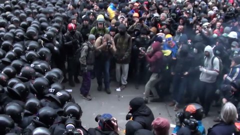 KIEV - DEC 1 2013:Ukraine Kiev. Storming of the presidential administration. Protesters clash with police