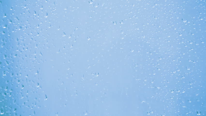 drops on glass - blue background