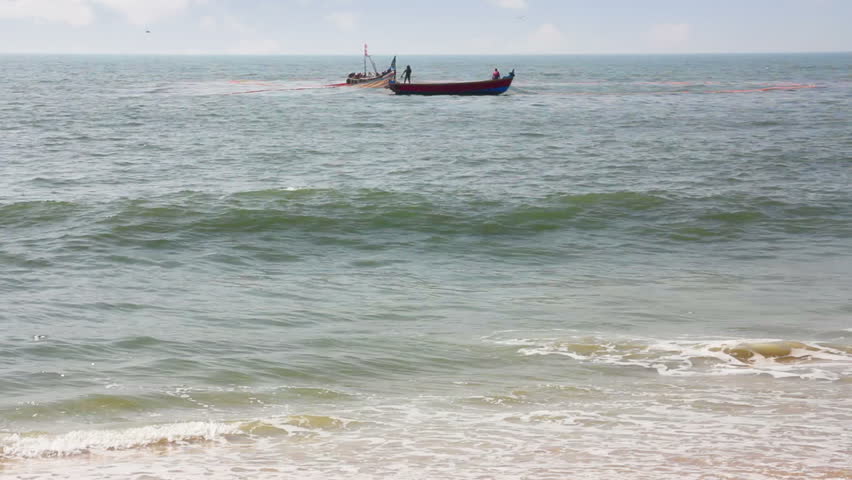 fisherman boats in sea - Kerala India