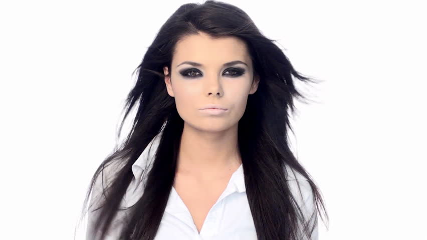 Young beautiful brunette with black scary makeup 