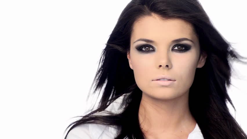 Young beautiful brunette with black scary makeup 