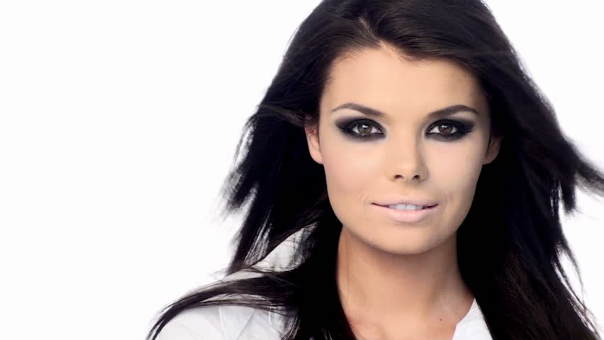 Young beautiful brunette with black scary makeup 