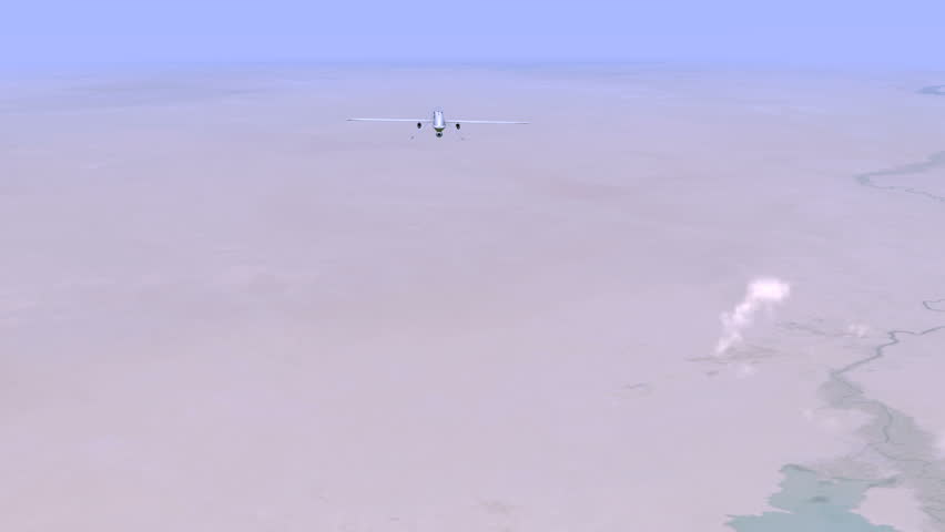 A Predator Drone flying at a high altitude