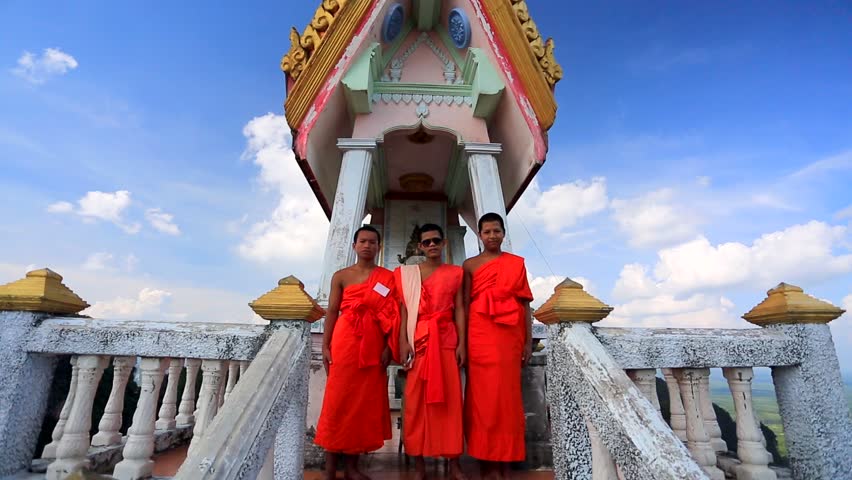 KRABI - CIRCA DECEMBER: Three young buddhist monks at Wat Tham Seua (Tiger Cave)